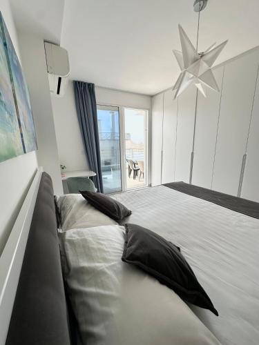 En eller flere senge i et værelse på Apartment Michaela