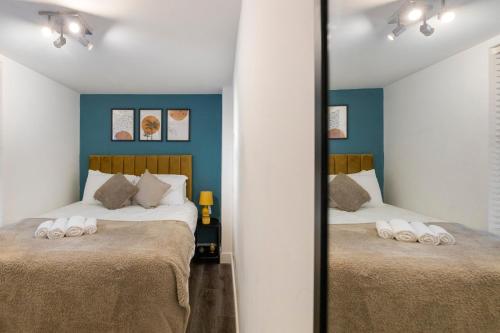 מיטה או מיטות בחדר ב-Notting Hill Retreat 2 Bedroom