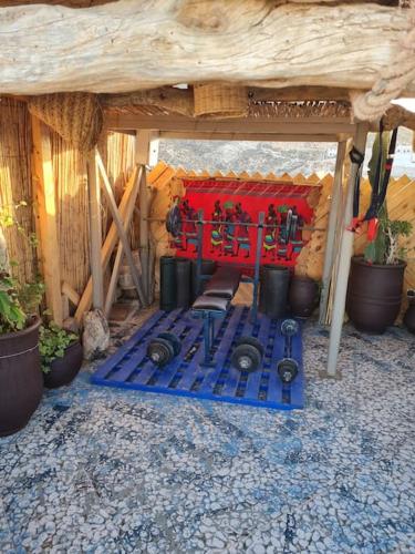 an outdoor kitchen with a stove in a house at Tamraght 2 Bedroom Apt with Oceanview 3. Level in Tamraght Oufella