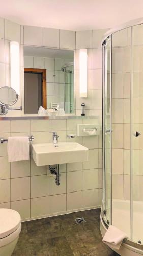 Un baño de Hotel Altes Stadthaus