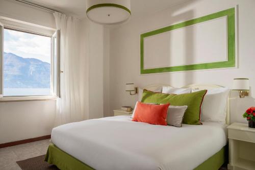 Postel nebo postele na pokoji v ubytování La Caletta Hotel Bolognese