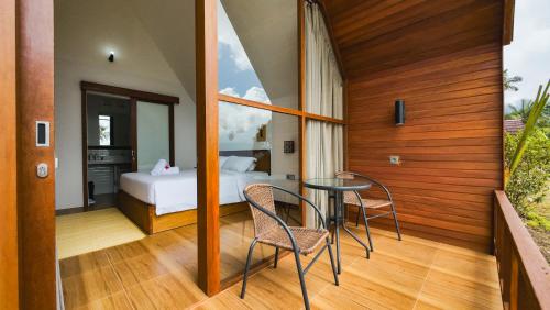 Postel nebo postele na pokoji v ubytování Catu Glamping Bedugul