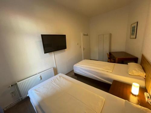Postel nebo postele na pokoji v ubytování Monteurwohnungen Linden 30451