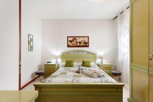 Säng eller sängar i ett rum på Casa Perry - Lago Maggiore