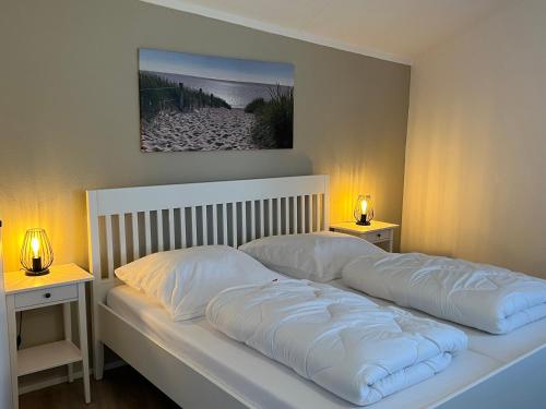 Postel nebo postele na pokoji v ubytování Hus Pompebled