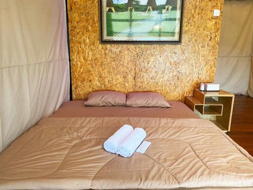Buana Glampingにあるベッド