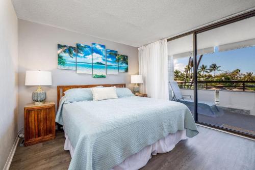 En eller flere senge i et værelse på White Sands Village#225