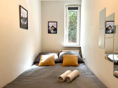 Postel nebo postele na pokoji v ubytování MMRent Hill Room