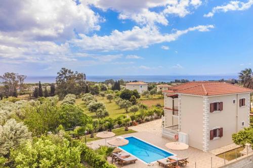 an image of a villa with a swimming pool at Villa Skala View in Skala Kefalonias