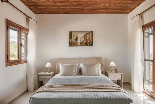 Кровать или кровати в номере Villa Skala Blue