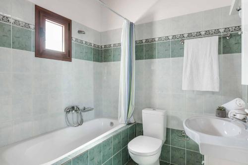 Ванная комната в Villa Skala Blue