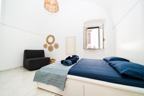 Postel nebo postele na pokoji v ubytování AcquaMarine by Vivimy