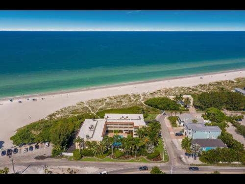 an aerial view of a hotel and the beach at 4200 GULF DRIVE UNIT 108 home in Holmes Beach