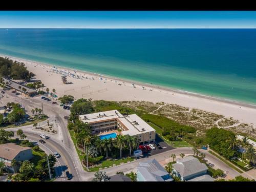 an aerial view of a beach and a building at 4200 GULF DRIVE UNIT 108 home in Holmes Beach