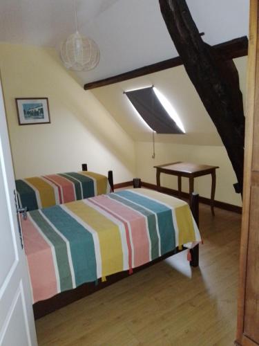 Posteľ alebo postele v izbe v ubytovaní Le mareuil gîte 7 chambres
