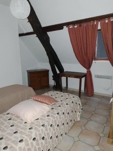 Posteľ alebo postele v izbe v ubytovaní Le mareuil gîte 7 chambres
