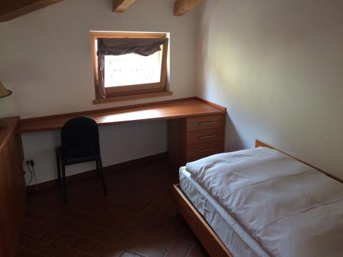 Katil atau katil-katil dalam bilik di Relais Palazzo Lodron