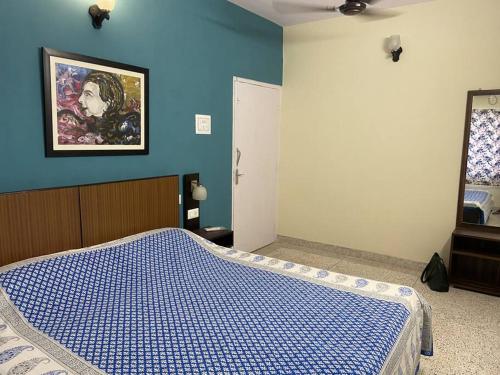 Cama o camas de una habitación en Ps Homes in central Kolkata