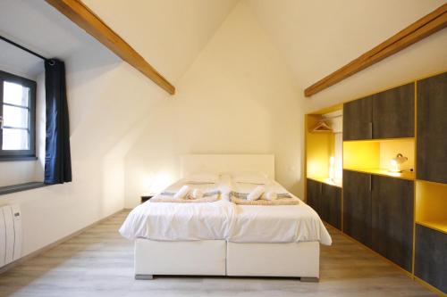 Katil atau katil-katil dalam bilik di Appartement Le Ch'ti Alsacien