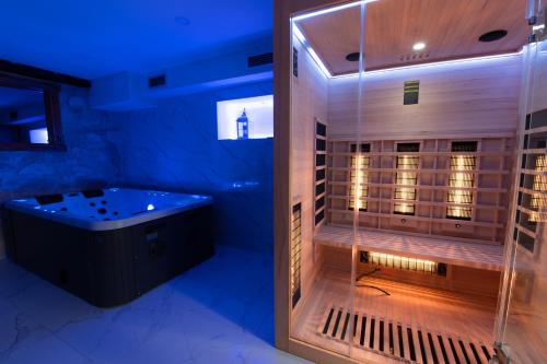 a large bathroom with a tub in a room at Villa Old Town in Šibenik