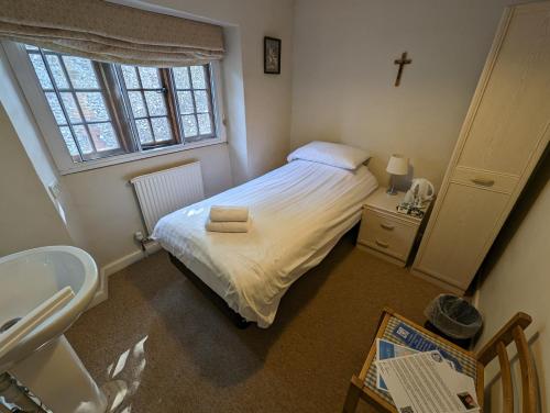 Ein Bett oder Betten in einem Zimmer der Unterkunft The Shrine of Our Lady of Walsingham