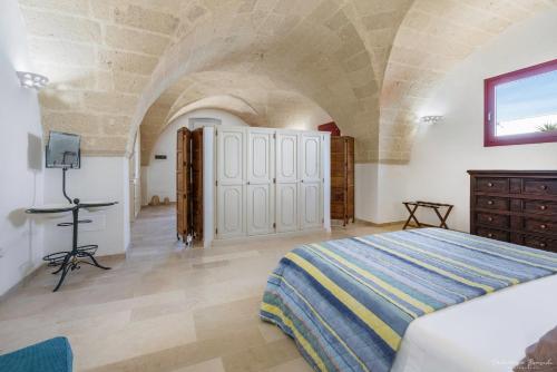 Postel nebo postele na pokoji v ubytování Masseria Rescio