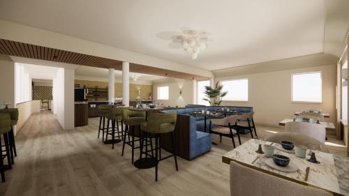 a rendering of a restaurant with tables and chairs at Strandhotel de Logerij in Renesse