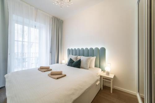 En eller flere senge i et værelse på A Prague Apartments - Lesser Town