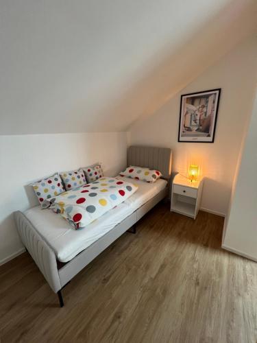 Кровать или кровати в номере Maisonette Wohnung in der Altstadt