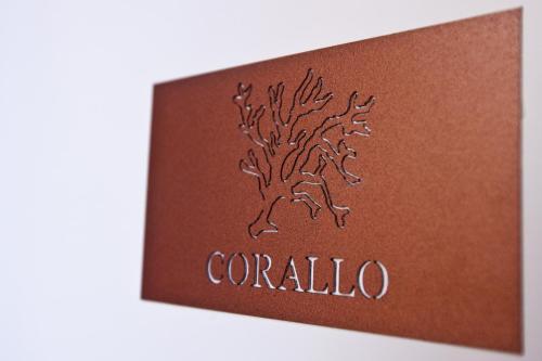 a brown card with a tree on it at Salamureci Camere in Trapani