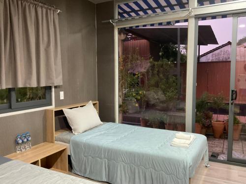 Katil atau katil-katil dalam bilik di LỌ LEM CINDERELLA HOMESTAY