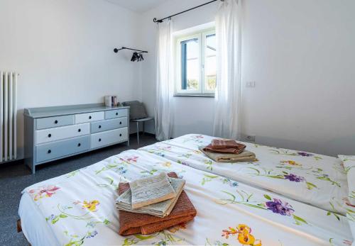 En eller flere senge i et værelse på Casa Carlo - ACrapa Mangia