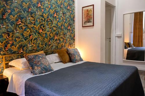 A bed or beds in a room at La residenza del Principe