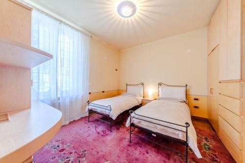 Postel nebo postele na pokoji v ubytování Carpegna Town Suites