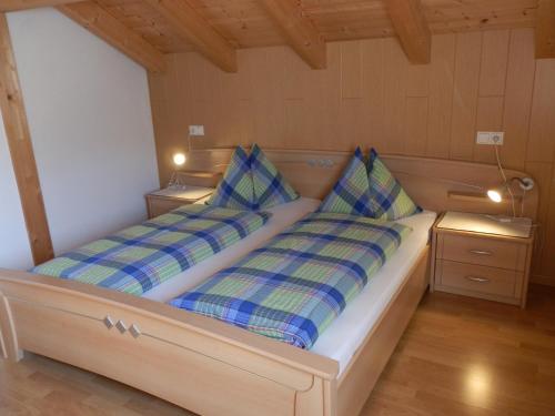 Katil atau katil-katil dalam bilik di Apartments Rienznerhof