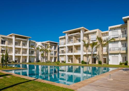 Bazén v ubytování Appartement moderne CASABAY BEACH Sidi Rahal nebo v jeho okolí