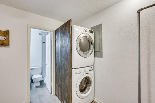a laundry room with a washer and dryer at 7 Mi to Winery Lakefront Rockwall Home with Deck in Rockwall