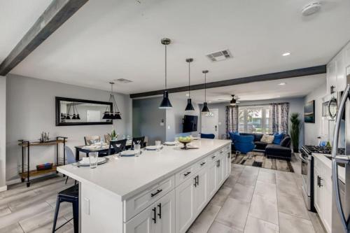 a kitchen with a large white island in a room at Old Town, Single story with Pool,Bunk Beds, and Games in Scottsdale