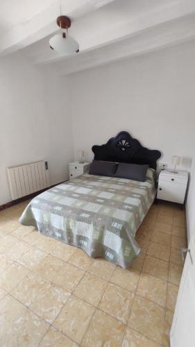 Postel nebo postele na pokoji v ubytování Cal Cascat