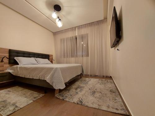 Postel nebo postele na pokoji v ubytování Appartement en Résidence avec Piscine