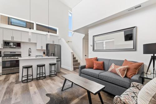 a living room with a couch and a table at Quarry A40 in Whitefish