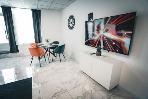 TV a/nebo společenská místnost v ubytování Apartmani Raguž, Ivankovo