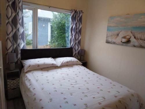 Postel nebo postele na pokoji v ubytování Bridlington Chalet The Hideaway