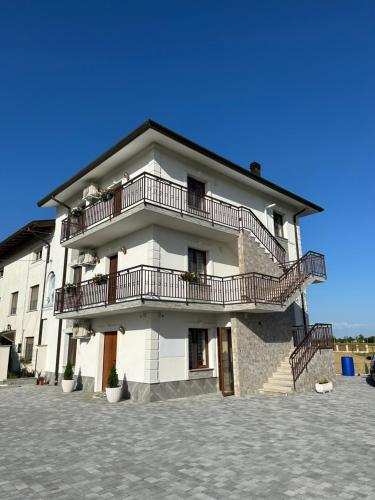 a building with balconies on the side of it at Damiani B&B 