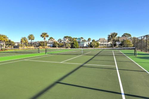 two tennis nets on a tennis court at Harbor Island Condo with Pool Access Walk to Beach! in Oceanmarsh Subdivision
