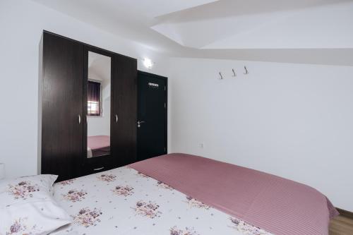 Ένα ή περισσότερα κρεβάτια σε δωμάτιο στο Paradise Bay Apartments