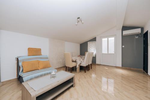 Ένα ή περισσότερα κρεβάτια σε δωμάτιο στο Paradise Bay Apartments
