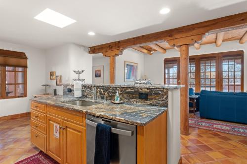 a kitchen with a sink and a counter at Quail run in Santa Fe