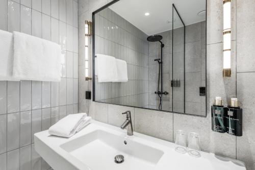 Koupelna v ubytování Home Hotel Tapetfabriken