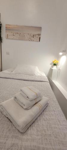 Ліжко або ліжка в номері Affittacamere Guesthouse Maristella